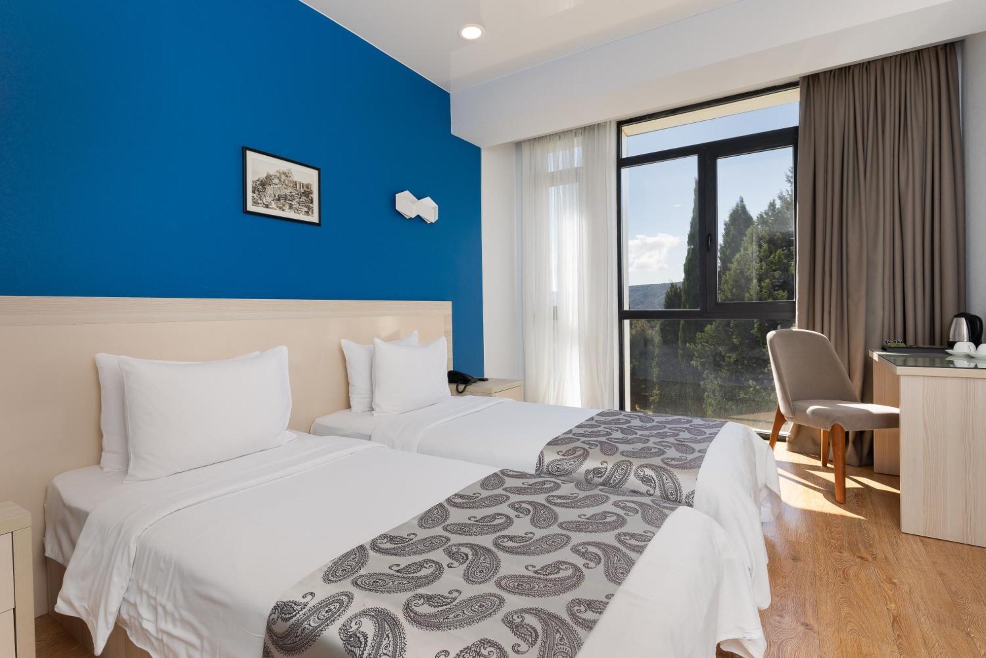 Iveria Inn Hotel Τυφλίδα Δωμάτιο φωτογραφία